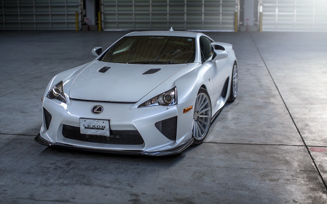White sports car garage front free wallpaper - medium preview image