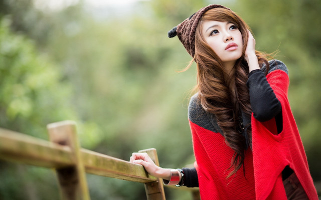Woman redsweater hat fence lookup free wallpaper - medium preview image