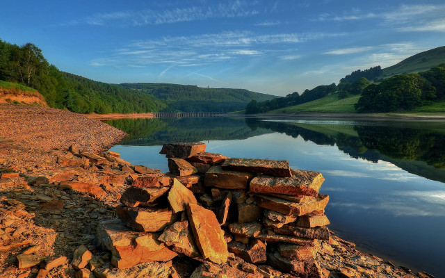 Lake shore rocks mountains blue free wallpaper - medium preview image
