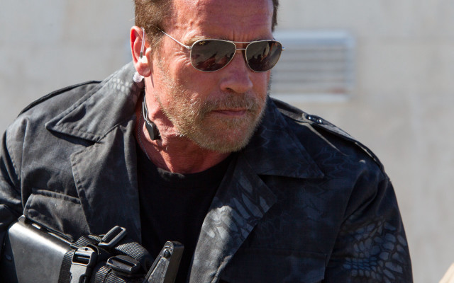 Bearded man sunglasses gun jacket free wallpaper - medium preview image