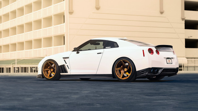 White sports car parking lot #10 free wallpaper - medium preview image