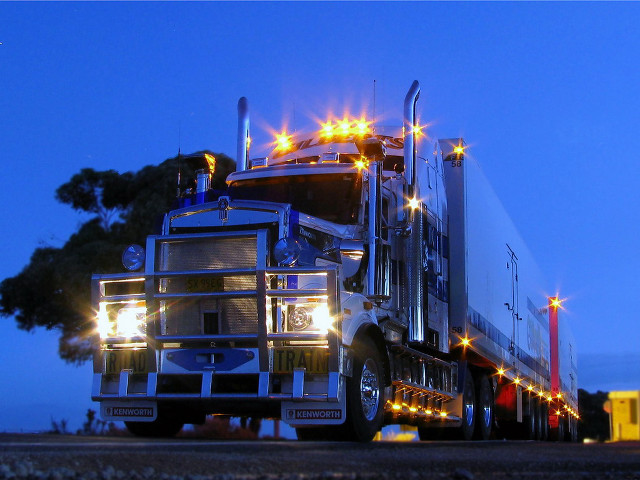 Large semi truck parking road free wallpaper - medium preview image