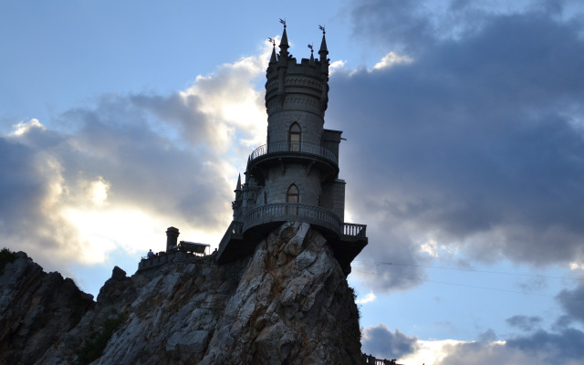 Castle mountain lighthouse cloudy sky free wallpaper - medium preview image
