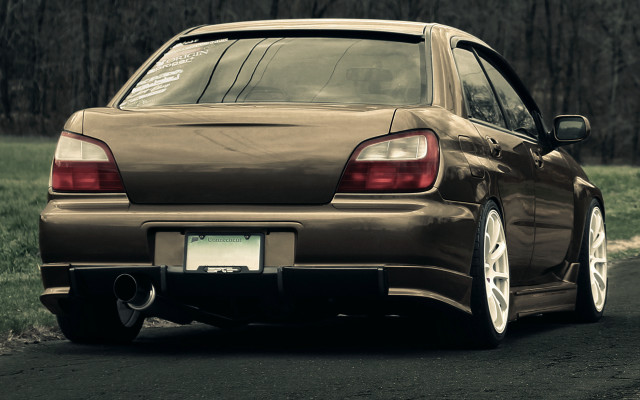 Brown car forest road sunny free wallpaper - medium preview image