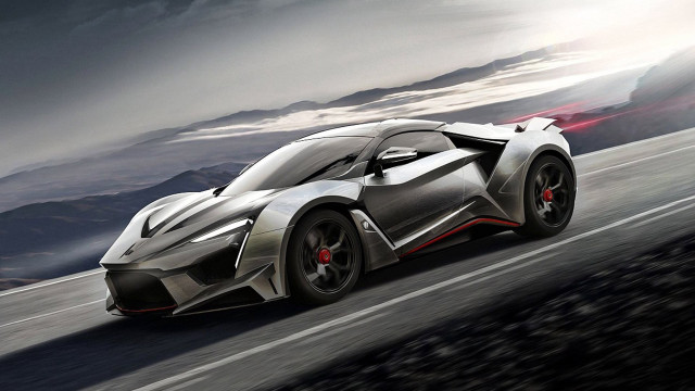 Silver sports car driving mountains free wallpaper - medium preview image