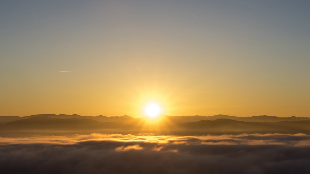 Sunset mountain range plane clouds #2 free wallpaper - medium preview image