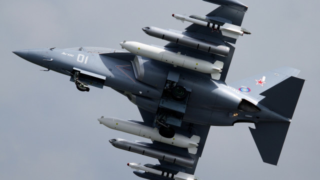Fighterjet cloudy sky landinggear pilot free wallpaper - medium preview image