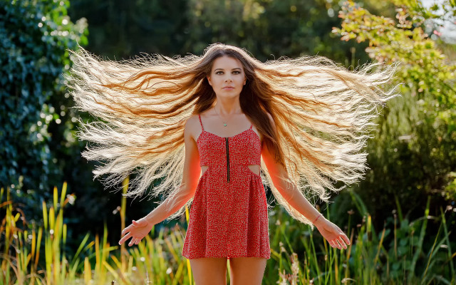 Woman long hair field arms free wallpaper - medium preview image