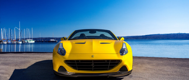 Yellow sports car beach water free wallpaper - medium preview image