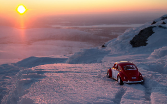 Toy car sunset snow tiltshift free wallpaper - medium preview image