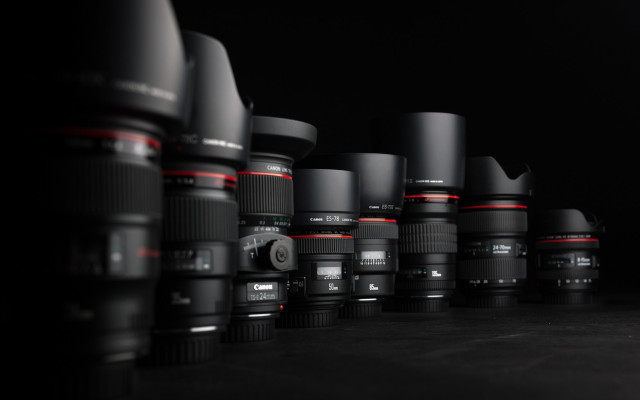 Camera lenses row black background free wallpaper - medium preview image