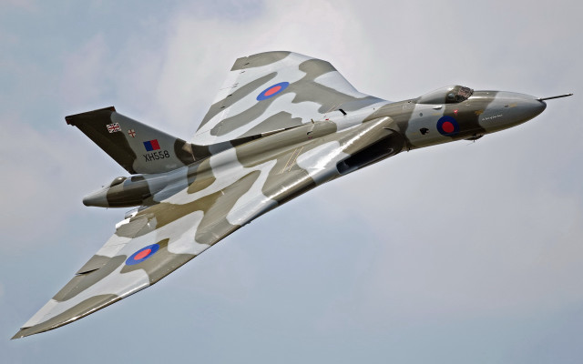 Camouflaged fighter jet cloudy sky #2 free wallpaper - medium preview image