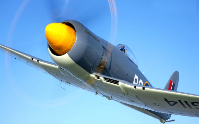 Propeller plane blue sky yellow free wallpaper - medium preview image