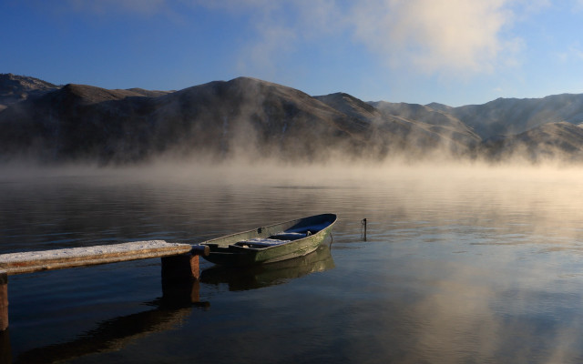 Boat docked lake mountains foggy free wallpaper - medium preview image