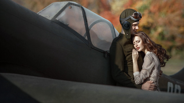 Man woman plane pilot leaning free wallpaper - medium preview image