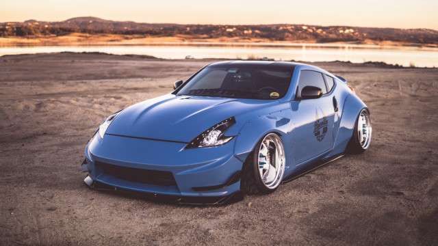 Blue sports car lake mountains free wallpaper - medium preview image