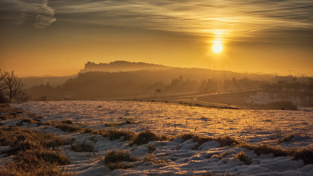 Snowy hill sunset cityscape ocean free wallpaper - medium preview image