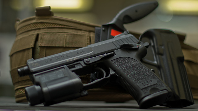 Gun luggage backpack tiltshift precisionism free wallpaper - medium preview image