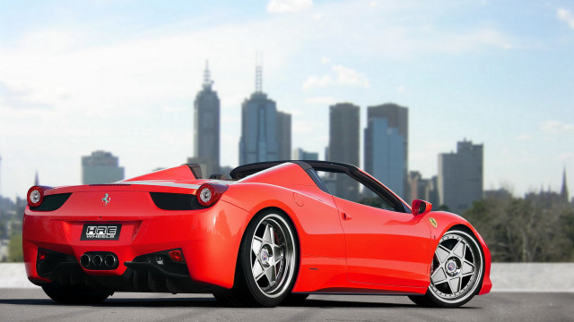 Red sports car city skyline #7 free wallpaper - medium preview image