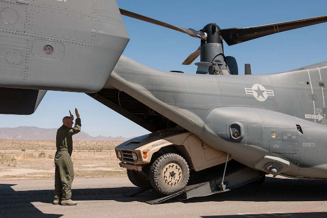 Man military vehicle helicopter door free wallpaper - medium preview image