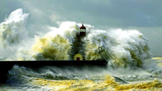 Lighthouse wave stormy ocean impressionist free wallpaper - medium preview image