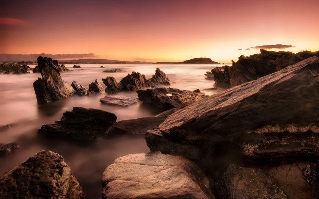 Sunset rocky beach mountains cityscape free wallpaper - medium preview image