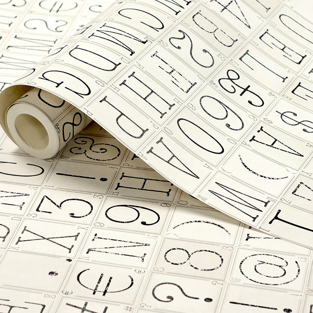 White tape black letters tabletop free wallpaper - medium preview image