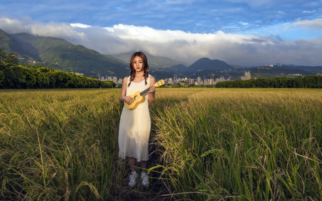 Woman field banana city clouds free wallpaper - medium preview image