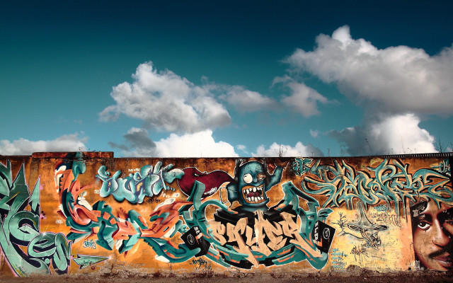 Graffiti wall cloudy sky mountains free wallpaper - medium preview image
