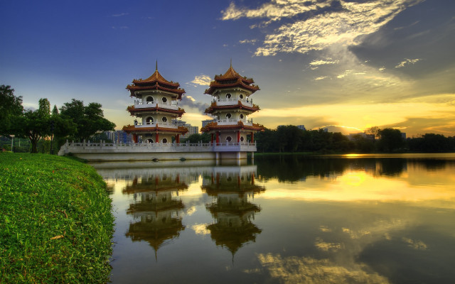 Sunset lake pagodas grassy sky free wallpaper - medium preview image