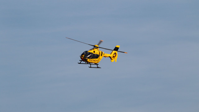 Yellow helicopter blue sky pilot #2 free wallpaper - medium preview image