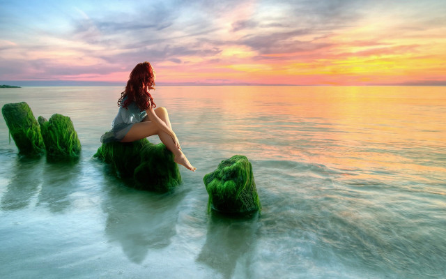 Woman rock ocean sunset beach free wallpaper - medium preview image