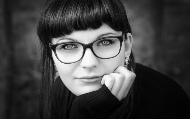 Woman glasses portrait bangs monochrome free wallpaper - medium preview image