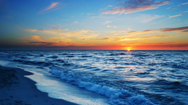 Sunset ocean waves boat sky free wallpaper - medium preview image