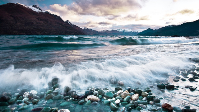 Rocky beach waves mountains sunset free wallpaper - medium preview image