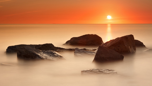 Sunset ocean rocks red sky free wallpaper - medium preview image
