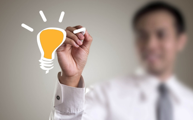 Man white shirt drawing lightbulb free wallpaper - medium preview image