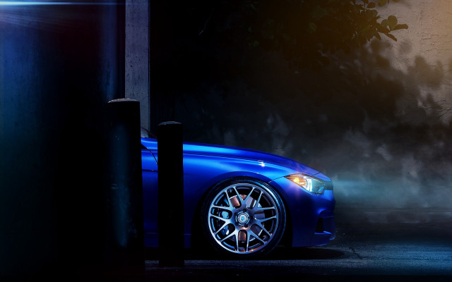 Blue car dark parking pole free wallpaper - medium preview image