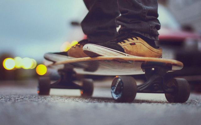 Skateboarder city night lights tiltshift free wallpaper - medium preview image