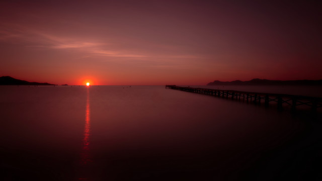 Pier sunset red sky mountains free wallpaper - medium preview image