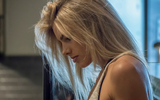 Blonde woman cellphone hallway stairs free wallpaper - medium preview image