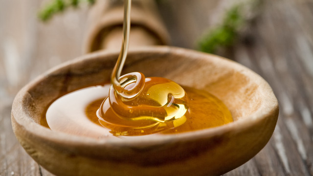 Wooden bowl honey spoon parsley free wallpaper - medium preview image