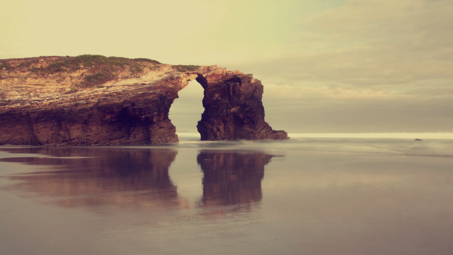 Rock formation reflection lighthouse sunset free wallpaper - medium preview image