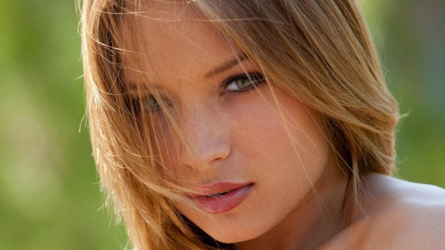 Woman blowing hair posing photorealistic free wallpaper - medium preview image