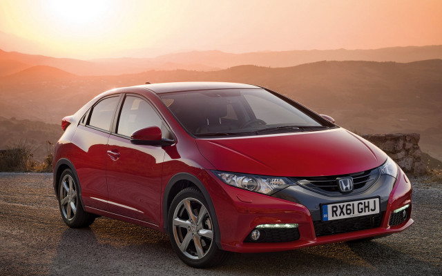Red car mountains sunset light free wallpaper - medium preview image