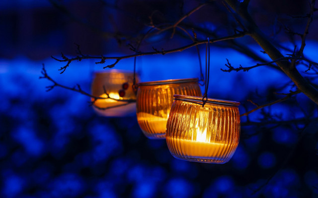 Lit candles hanging tree night free wallpaper - medium preview image