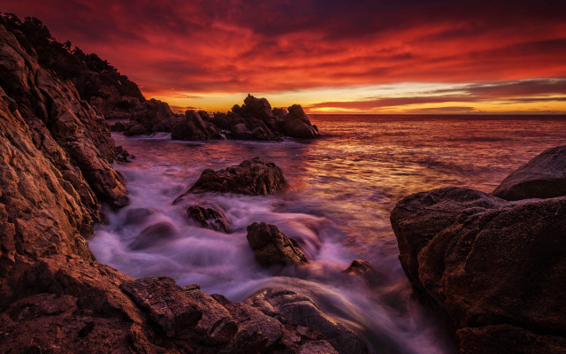 Red sky ocean rocks water free wallpaper - medium preview image