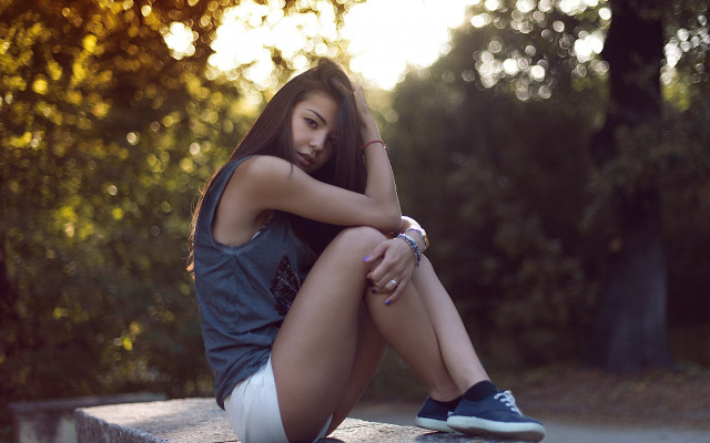Woman sitting park portrait jewelry free wallpaper - medium preview image