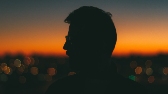 Man glasses sunset bokeh backlighting free wallpaper - medium preview image
