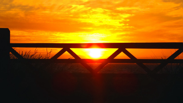 Sunset beach wooden fence grass free wallpaper - medium preview image